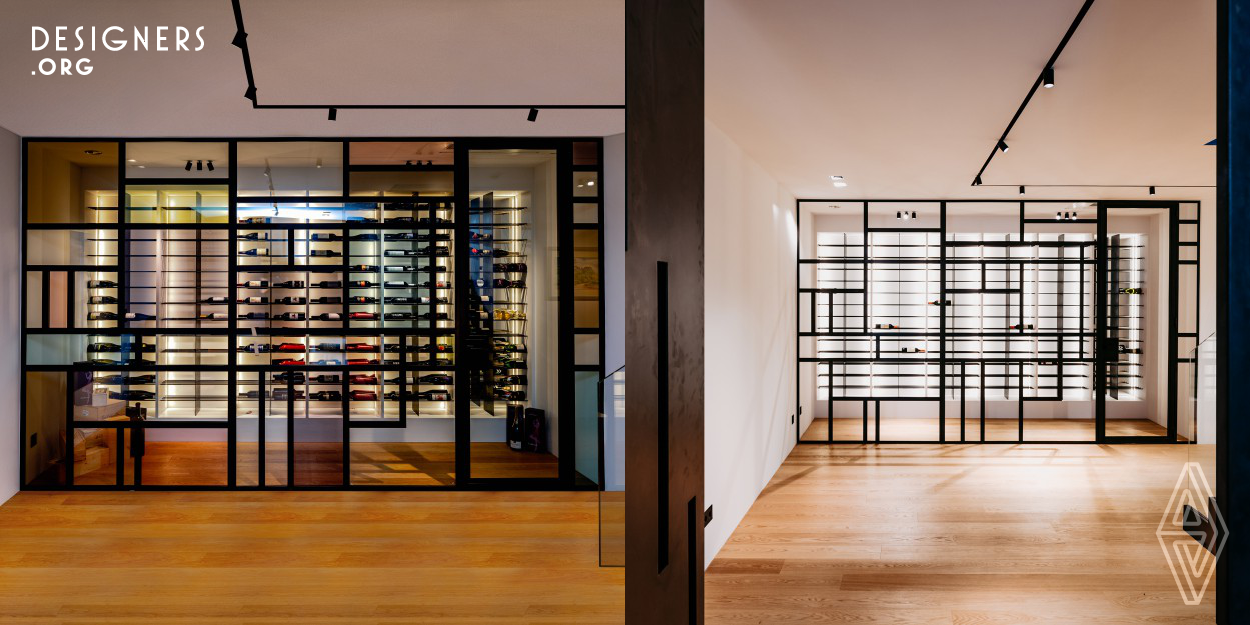 A wine cellar that draws all eyes. It is handmade and planned for a real wine lover. The combination of the burnished steel frames with partially colored insulating glass, make it look stable but at the same time airy. With special temperature control, this walk-in room provides enough space for cooling, storing and collecting wine. On the opposite side, there is a pivot door, also handmade of burnished steel. In the recesses of the door, the colored glass is found again.