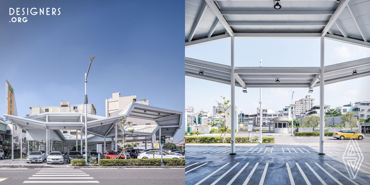 This project is a used car sales store. They hope that the store's image can be comparable to the design sense of a brand car factory. The space is full of greenery and the courtyard is distinct from other stores. Therefore, the design uses the shape changes of corrugated steel sheets to convey elements of the building's streamlined sense and the tension of space. The traditional-style courtyard is created to connect the outdoor greenery with the indoor space, increasing the sense of transparency and lighting, and enlarging the visual effect of the space. 