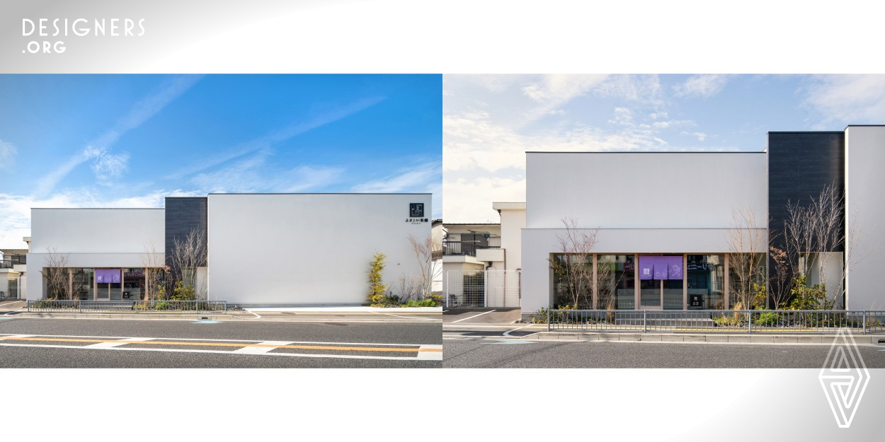 This is a store/factory plan that manufactures and sells Mizunasu, a specialty of Japan. The interior of the store is simple and finished in a modern space where you can feel Japanese elements. The exterior, which can be seen from the road in front, contrasts with the windowless factory area on the right, and the store on the left has an opening overlooking the store, designed to encourage customer guidance. A different material is used as an accent in the center, and the design takes into consideration the balance between the left and right sides.