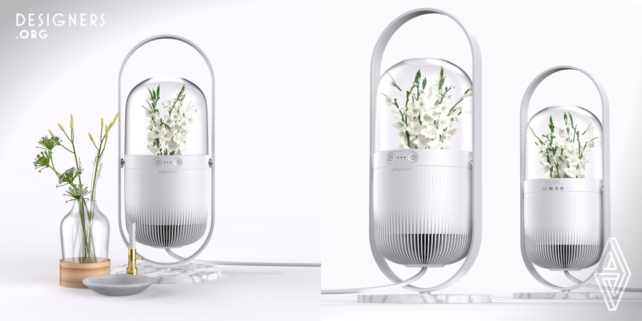 Potpourri combines natural aromatherapy and flowers to humidify the air. The humidifier provides moisture to the flowers, and when it is activated, it releases a pleasant aroma. This device has a transparent acrylic cover to protect the plants while allowing natural light to pass through. Additionally, the cover creates a partially enclosed space for the flowers, promoting water circulation and reducing the need for watering. Potpourri's modular base and flowerpot structure make it easy to install and clean.