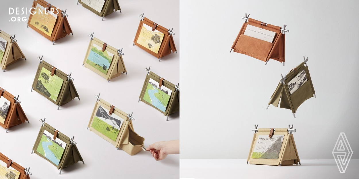 Introducing the DIY Camping Tent Calendar, a unique design inspired by outdoor camping. With simple assembly using iron rods and fabric, it brings the camping experience to your home. The tent has a storage compartment for stationery and supplies, and a pocket for calendar cards and work notes. Made with aluminum alloy and sailcloth fabric, the design is practical and durable. Sustainability is emphasized through eco friendly packaging and charming linen prints depicting camping adventures.