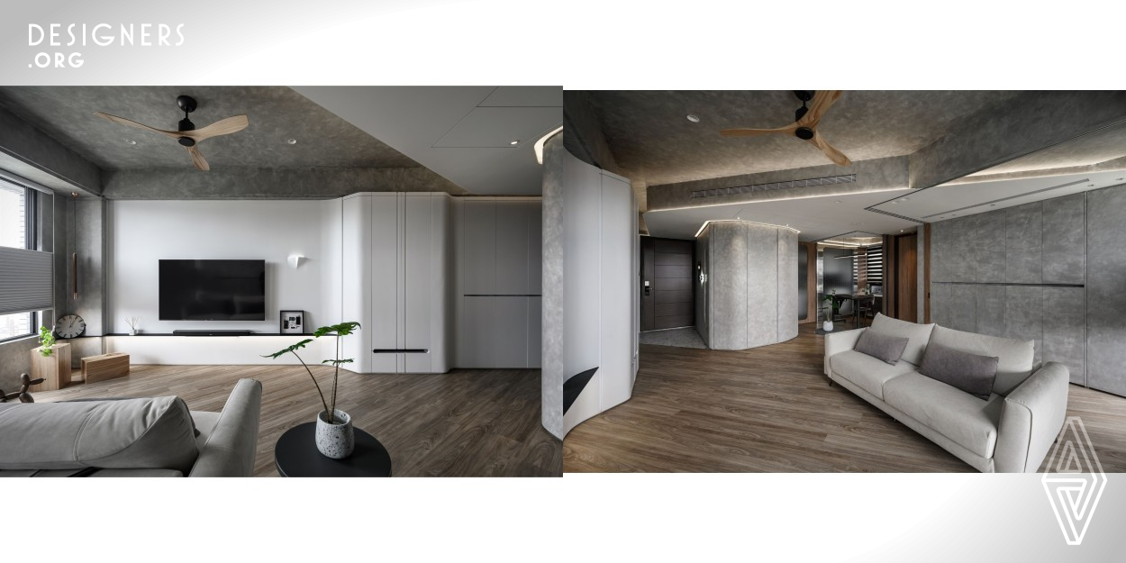 In the 59 square meters residence, the closed floor plan is transformed into an open and flexible layout, providing a generous visual depth that balances functionality and aesthetics. The limitation of the horizontal and vertical axes in the base gives a confined feeling. To make the space feel open and spacious, the ceiling, flooring and cabinets are extended with sloped surfaces, diagonal lines and beveled corners. The slopes run through the living room to the multi-functional area. 