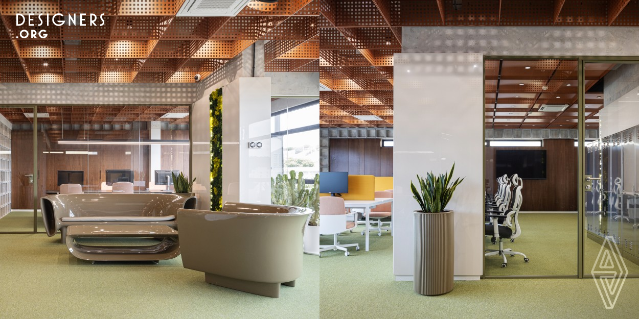 This project focused on transforming a challenging space, characterised by low ceilings and limited daylight, into a well-lit and comfortable workspace. The design strategy involved the use of suspended ceiling structures to create an illusion of height beneath the existing concrete floors, coupled with strategically placed artificial lighting to ensure uniform illumination throughout the office. Ceramic panels were employed to visually expand the workspace, while the inclusion of concrete elements added architectural depth.