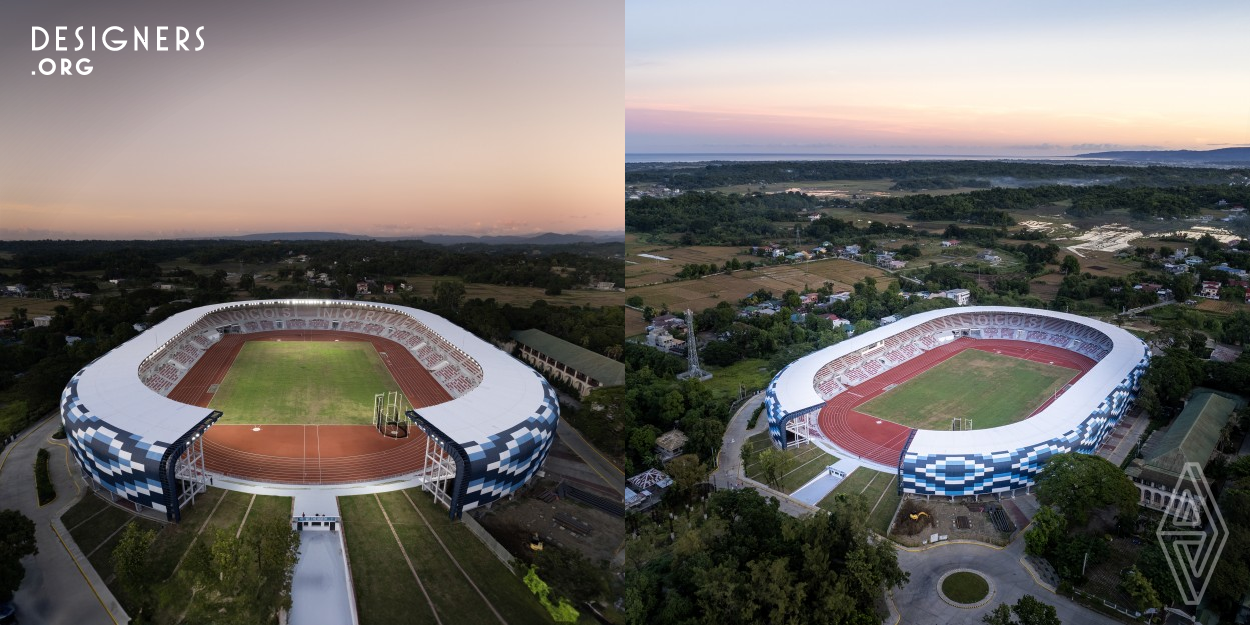 This is an open stadium that is an integral part of the community. A stadium that would extend the adjacent park and connect with the university. The southern end of the stadium incorporates a sloping lawn where people could walk up or have picnics and leads to an amphitheater with a magnificent backdrop. This expression of social architecture creates a barrier free stadium that is accessible to everyone. This is both a stadium and a park, a space that does not discriminate. It is social infrastructure that helps bond the community. It is a stadium for the people.