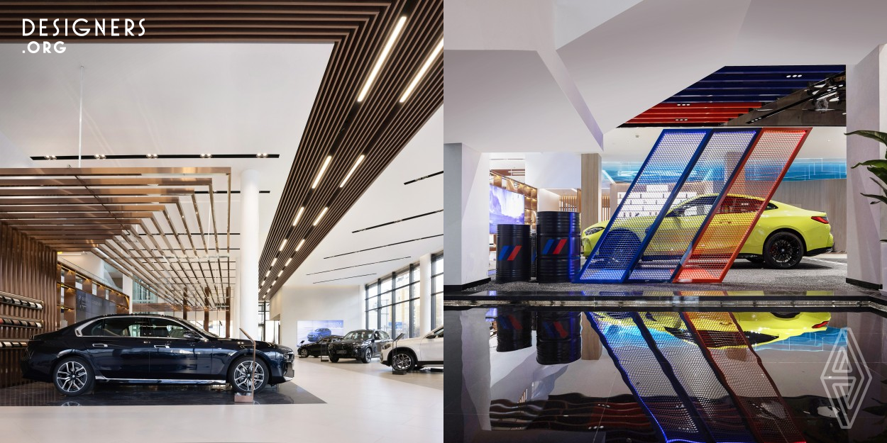 The entire project is designed based on a unique and penetrating circular motion line. The ceilings on the first and second floors are covered with blue acrylic transparent panels. The shape not only symbolizes the dynamic driving trajectory of BMW racing cars, but also means flowing water ripples, echoing the water landscape composed of a water curtain and a pool. BMW's iconic three-color slash bar becomes a partition and stands proudly on the waterside, with the noumenon and mirror blended together perfectly, making people experience the movement in static state.