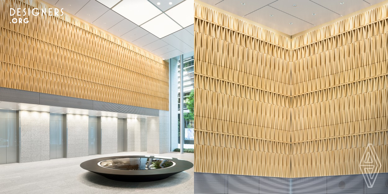 It offered creative direction for Takeda Pharmaceutical's new global headquarters’ interior design. The designer created a flow from the entrance and reception to the work area, telling a tale of human life with refined modern icons of eight kanji for life, water, light, soil, tree, people, connections, and future, which represent Takeda's essence, reflecting it in the spatial design. It conveyed the company's brand image, creating a place where stakeholders can share the vision of the future. 