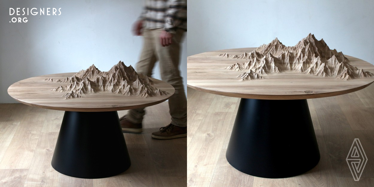 Our connected world requires to live fast and efficiently. That's why the real luxury today is the ability to slow down, take time and be surrounded with beautiful things made with care and respectful of the environment. This coffee table with a sculpture of a mountain on its top evokes the poetry of the endless horizons and plunges the spectator into a contemplative state. This project bridges the gap between design, art and craftsmanship to combine aesthetic and practicality. The wood used to make this table comes from sustainably managed forests and the top is entirely hand-carved.