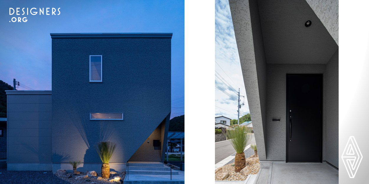 The Sliced House was built by Japanese architect Yukihiro Nakagawa in Bizen City, Okayama Prefecture, Japan. The compact design of the house eliminates wasted space and maximizes family and storage space. Entranceway is characterized by cutting the first floor at an angle from two directions, while also reinforcing the structure to meet Japanese regulations and withstand earthquakes. The windows provide a beautiful view of nature that changes with the seasons and also let in ample light, making the design environmentally friendly. 