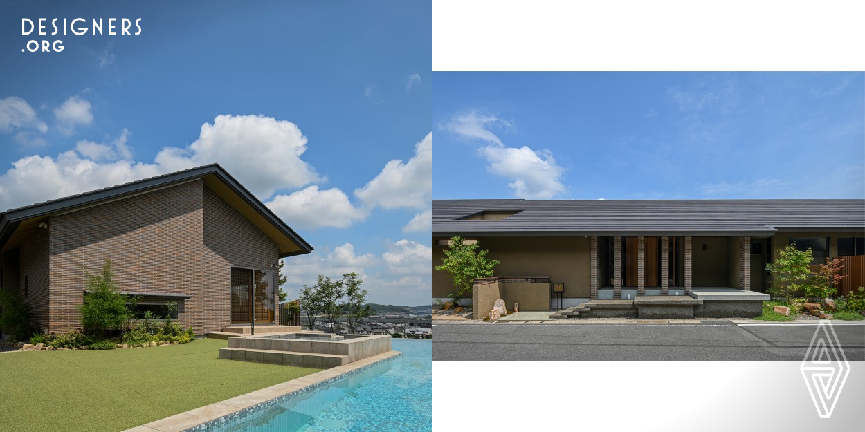 This was was built in Okayama prefecture, Japan. The house is designed to be like living in a museum where art is displayed and art becomes a part of daily life. The walls of the house are all brick, which looks monotonous but it blends beautifully with the surrounding nature and is never come to boring. The entrance creates welcoming space with a bright wood ceiling. A flat hallway leads to a gallery space where visitors can enjoy artwork and beautiful lighting fixtures.