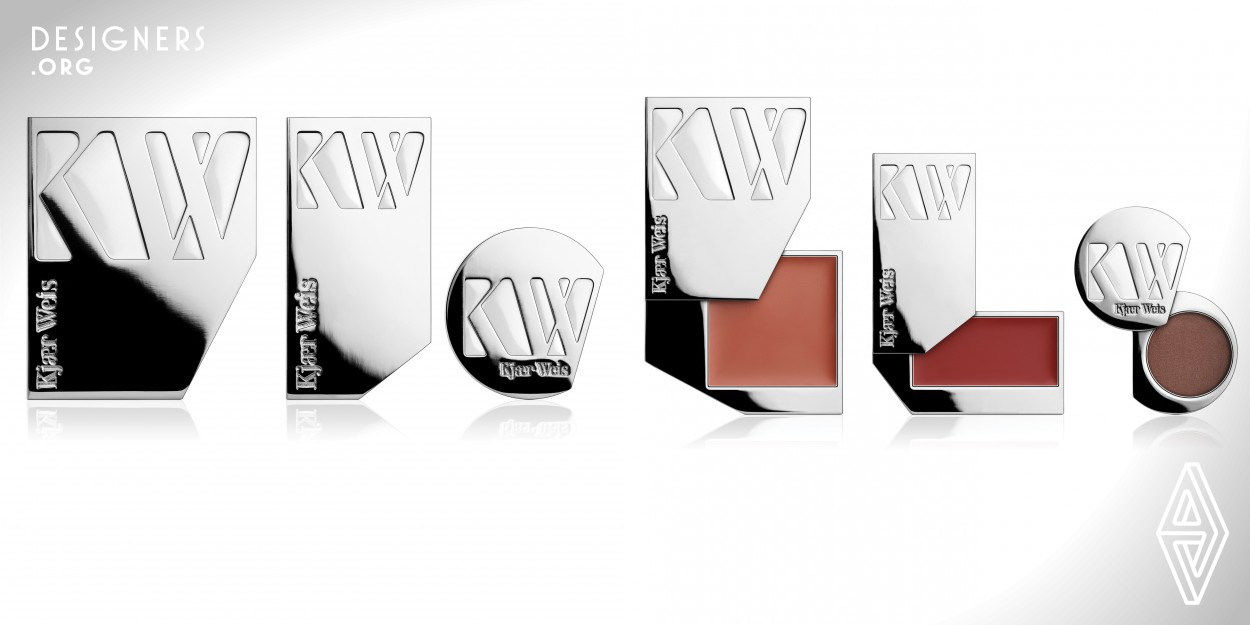The design of the Kjaer Weis cosmetics line distills the fundamentals of women’s makeup to its three essential areas of application: lips, cheeks and eyes. We designed compacts shaped to mirror the features they will be used to enhance: slim and long for the lips, large and square for the cheeks, small and round for the eyes. Tangibly, the compacts swivel open with an innovative lateral movement, fanning out like the wings of a butterfly. Entirely refillable, these compacts are purposely conserved rather than recycled.