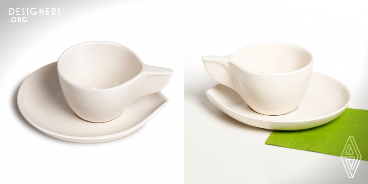 A cappuccino cup and saucer set with a unique, distinguished and eye-catching design for coffee breaks. The idea behind this project was to create a desirable, high quality product that would reflect local craftsmanship excellence with design sensitivity. Each piece is made of hand molded porcelain in a local Montreal ceramic workshop. The cappuccino set features a 6oz. cup with a minimalist straight handle and an interesting saucer with a define cup placement area and dimensions to allow snack space. The cups and saucers are stackable and design to fit most standard espresso machines. 
