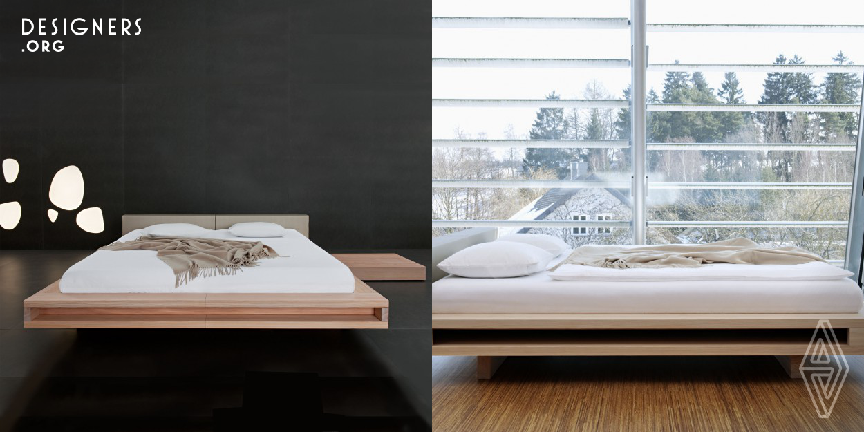 The "Guten Morgen - Pure Light" bed is an oasis for good sleep. The design of this extraordinary bed is the key to its incredible comfort. We concentrate on the development of three areas: The air gap along its whole long side makes an air circulation possible, so there can no water accumulate in the mattress. The strong frame construction with its integrated massive larch-board does avoid radiation loss. Due to the larch construction the radiation of water veins is verifiable reduced. The larch wood for the frame is chosen and manufactured by hand without any bolts or metallic connections.