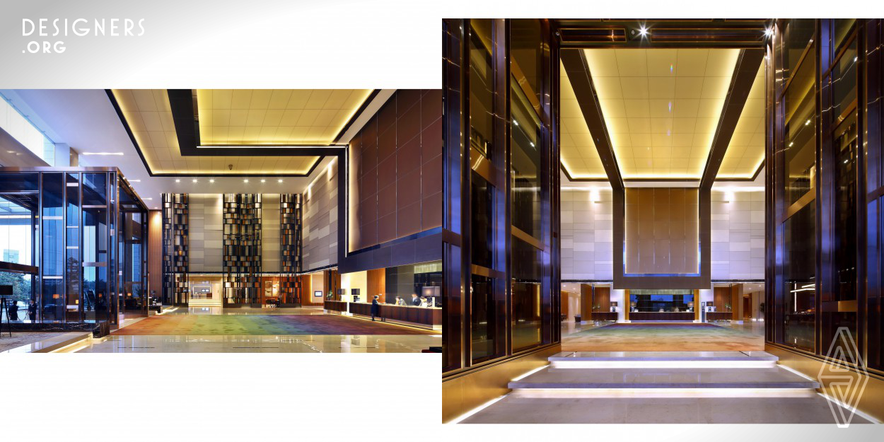 Modern geometrical approach on traditional ‘Chinese screen with views’ concept were applied on hotel main lobby to transform an upscale spacious environment. These screen dividers separate different functions of spaces but also link up the whole lobby area together to create different view on different angle and privacy sufficiently. Environmental friendly materials and LED lighting as the major materials on the project. Warm tones of different shades and materials with accent wood veneer finishes were used to enhance a warm and cozy welcome atmosphere.