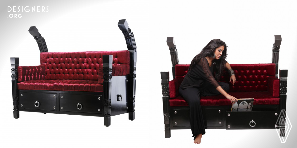 The Mowraj is a two-seater designed to embody the spirit of ethnic Egyptian and modern Gothic styles. Its form was derived from the Nowrag, the Egyptian version of the threshing sledge altered to embody the Gothic flair without compromising its ethnic antediluvian essence. The design is black lacquered featuring ethnic Egyptian handcrafted engravings on both arms and legs as well as rich velvet upholstery accessorized with bolts and pull rings giving it a medieval thrown like Gothic appearance. 
