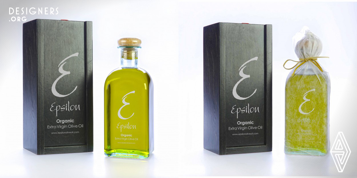 The Epsilon olive oil is a limited edition product from organic olive groves. The entire production process is done by hand, using traditional methods and the olive oil is bottled unfiltered. We designed this pack wanting to ensure that the sensitive components of highly nutritious product will be received by the consumer from the mill without any alteration. We use the bottle Quadrotta protected by a wrap, tied by leather and placed in a handmade wooden box, sealed with sealing wax. So consumers know that the product came directly from the mill without any intervention.