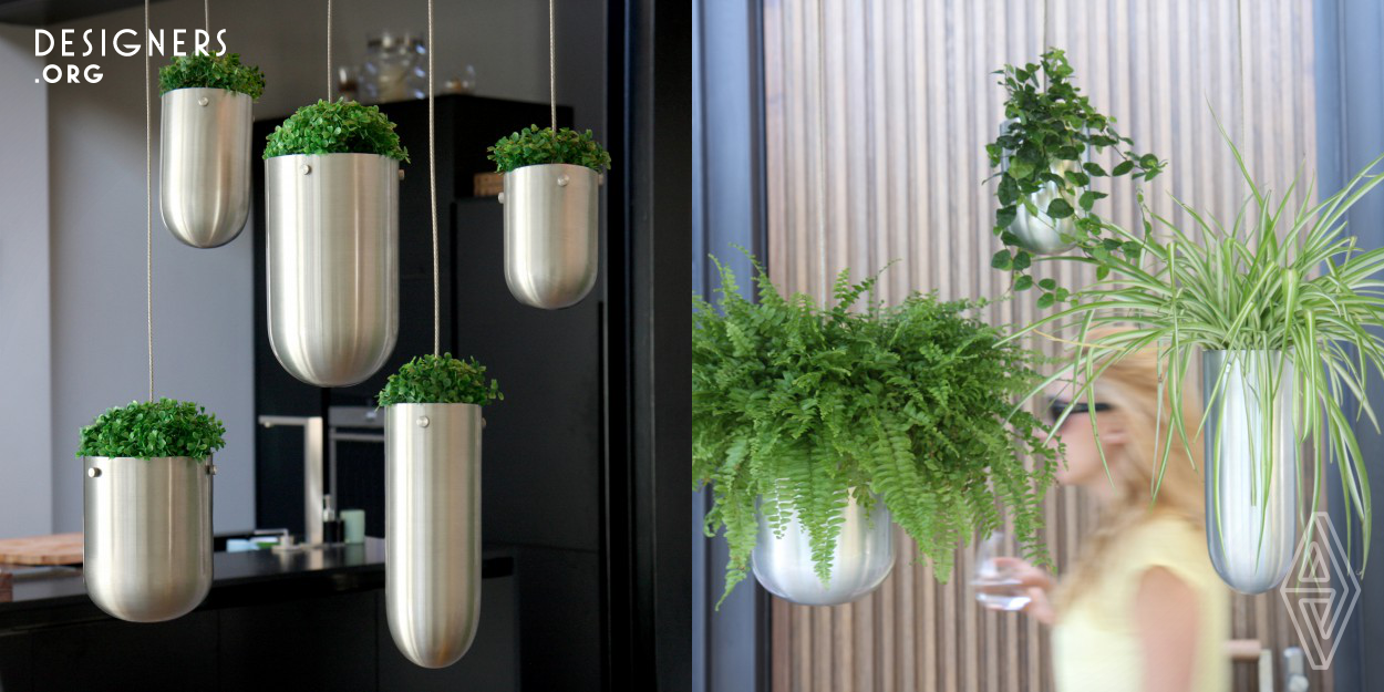 These Hanging Flower Pots are “floating” in the air and thus emphasize space and dimensions in the room because of the 3D effect. It’s a completely new way to decorate your home with living plants and flowers, in a very unique and elegant way. The perfect balance is provided by the combination of the feminine shapes and masculine materials in one minimalistic design. The Floating Garden fits perfectly into any modern interior and it also fulfils nowadays food-lovers' dreams, to grow their own herbs in their modern kitchen in a very decorative way.
