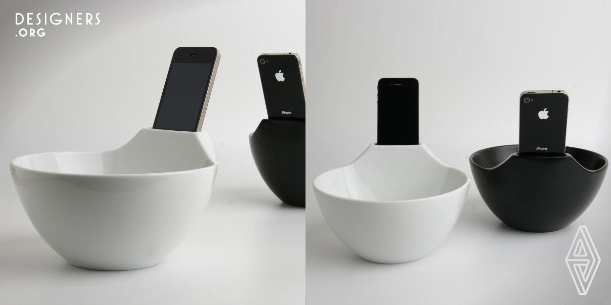 Anti-loneliness Ramen bowl addresses the social phenomena of addiction to the use of high-tech handheld devices such as smart phone. The uniquely sculptured form is the result of double layered ceramic for creating the concaved cavity for holding phone device. As the current society relying on the digital media, people try to connect online even during their mealtime for looking through the social medium with their smart phones. Anti-loneliness Ramen bowl is the hybrid-design of phone dock with noodle bowl for solving those issues. 