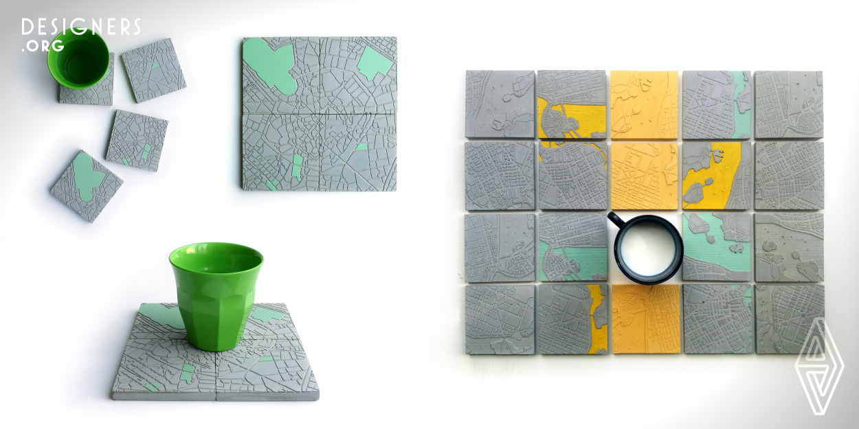 The Concrete Cities project presents a series of contemporary design souvenirs for the modern traveler and the city lover, in the form of concrete coasters. The city center's map relief appears on the surface of a set of four or six concrete coasters (fragments), forming a puzzle, which can also be used as a pot holder, a wall piece or press-papier. This contemporary souvenir diverges from its traditional ancestors, and becomes a design everyday-use object, decorative yet functional, allowing the user to recall memories of his favorite cities, while enjoying a cup of coffee.