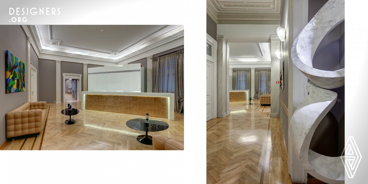 A neoclassic residence remodeled to accommodate wellness and spa. Taking into account the elaborate plaster decorations, antique oak wood flooring and natural daylight, the design proposal was to introduce materials that draw the distinctive line between old and new. The application of lavaplaster on floors and walls, laminated formicas, glass and quartz mosaics dominate the interior while the color palette redefines the classic identity.Warm earthy tones add the patina of antiquity, while the power of black in metallic features add a dynamic element in the emitted romanticism of neoclassism.