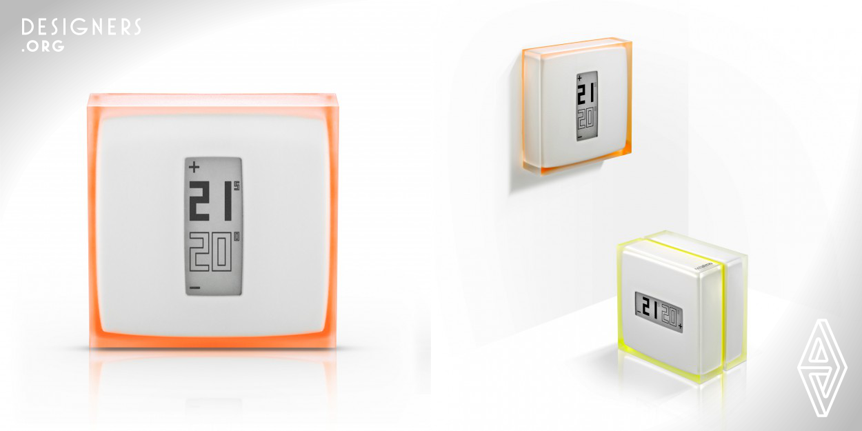 The Thermostat for Smartphone presents a minimalist, elegant design, in breach with traditional thermostat designs. The translucent cube goes from white to color in an instant. All you have to do is apply one of the 5 interchangeable color films on the back of the device. Soft and light, the color brings a delicate touch of originality.  
Physical interactions are kept to a minimum. A simple touch allows to change temperature while all other controls are made from the user's smartphone. The E-ink screen chosen for its unparalleled quality and minimal energy consumption.