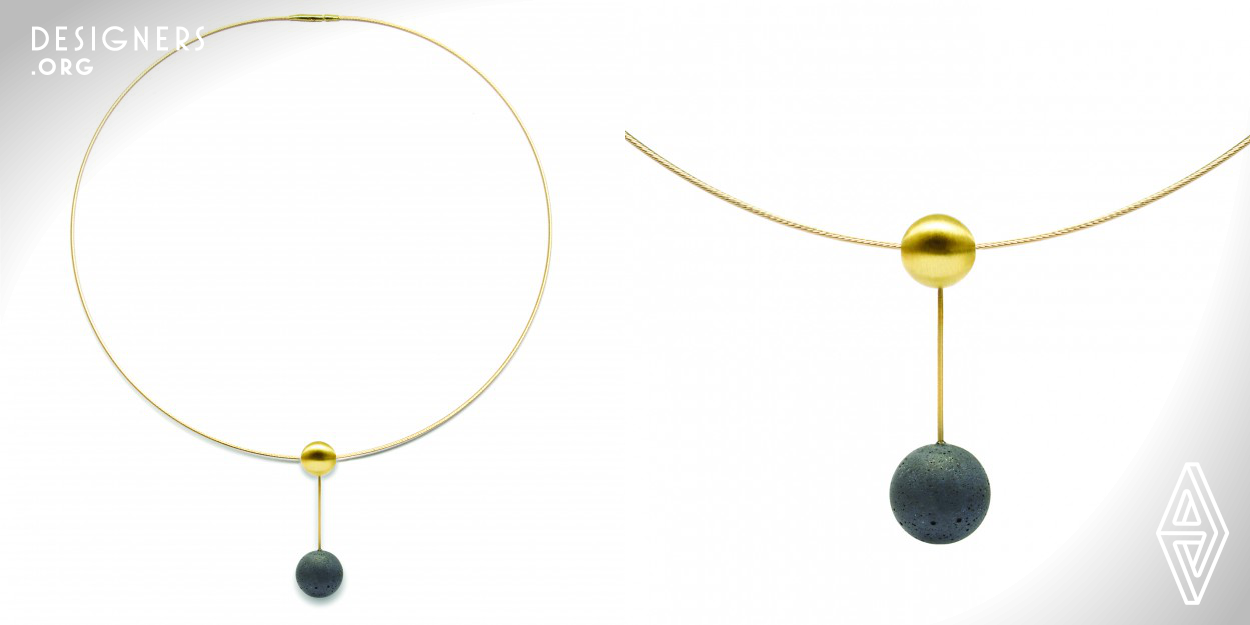 This necklace is created from a cast concrete sphere which is suspended from a hand-forged hollow 18k gold sphere.The Orbis Collection is an extensive three year culmination prototyping perfectly cast concrete and hand-forged spheres. The results achieved with this important new collection are Konzuk’s finest work to date and appeal to a wide audience. These minimalist, elegant pieces elevate concrete into fine jewelry when paired with gold. The Orbis Collection is clearly distinctive.