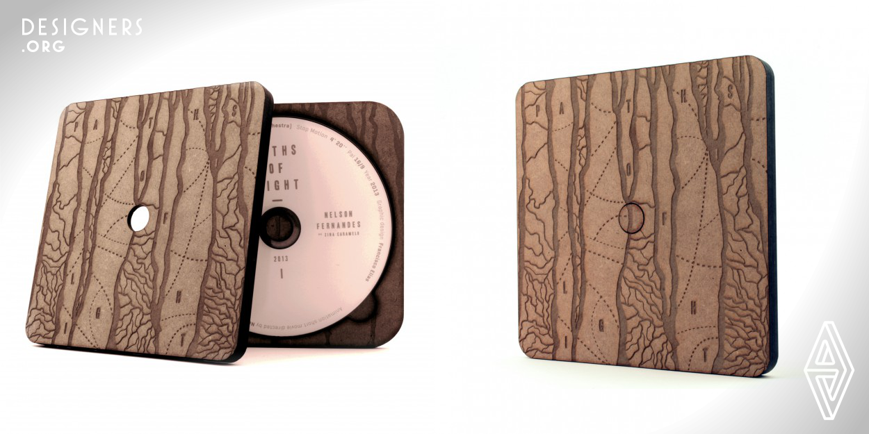 The best way to hold the short animation Paths of Light by Zina Caramelo was to ensure that the DVD had a beautiful case to match. The packaging actually looks like it was plucked from the woods and moulded to form a CD. On the outside, various lines are visible, almost appearing as small trees growing up the side of the case. The wooden exterior also helps to give it an extremely naturalistic look. Paths of Light is an extreme update from the cases many saw for CDs in the 1990s, which usually consisted of basic plastic with a paper package to explain the contents inside.(text by J. D. Munro)