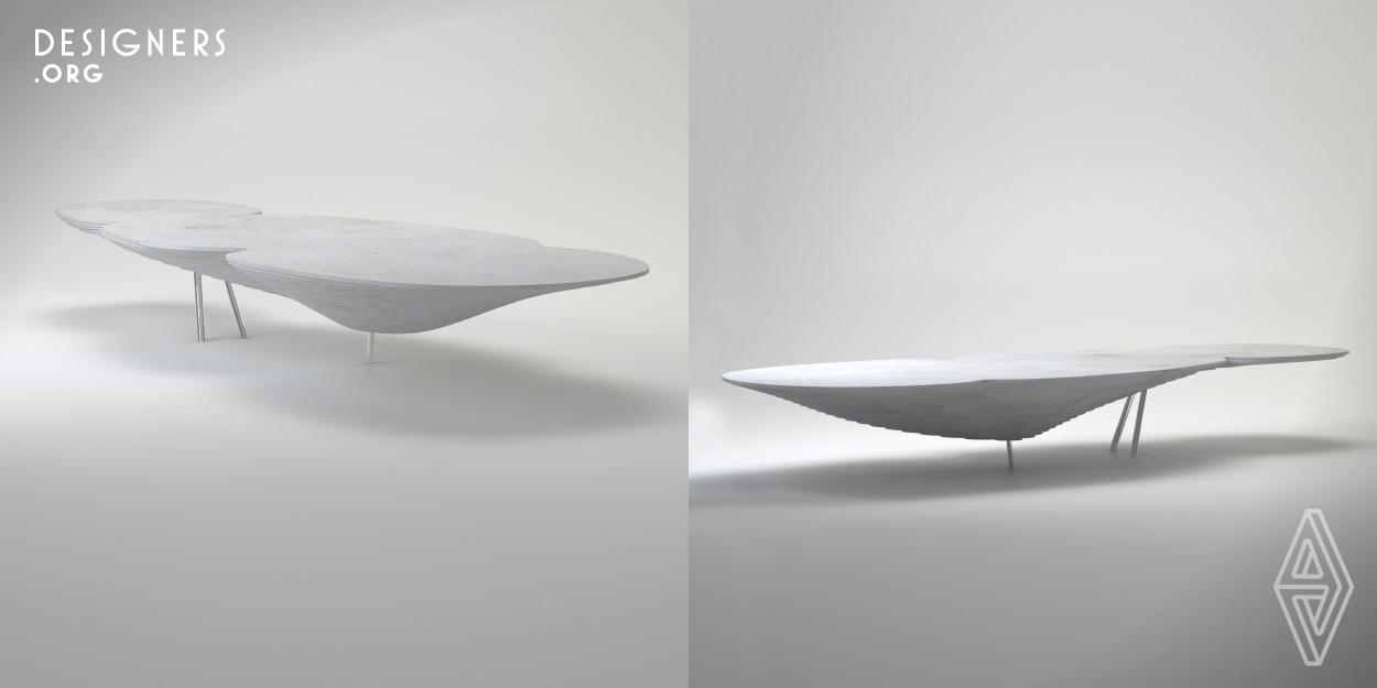 This multipurpose table was designed by Bean Buro principle designers Kenny Kinugasa-Tsui and Lorene Faure. It functions as a central element in an interior setting. The overall shape is full of playful wiggly curves, which dramatically contrasts with the traditional formal symmetrical tables, thus it stands out as a sculptural piece to entice and interact with users. The curves appear to be accidental at first sight, however each curve has been carefully designed to encourage a variety of seating positions and social interactions.