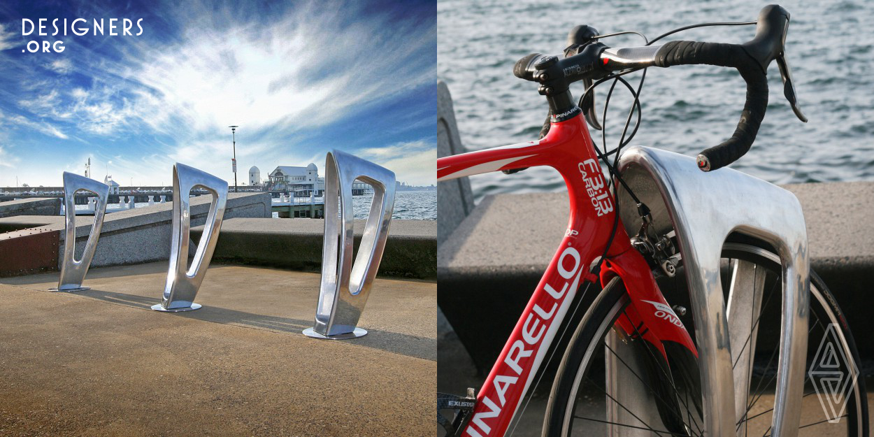 The Zephyr is a multifunctional bicycle storage bollard. As pictured here on the waterfront in Geelong (Australia), the Zephyr is a sculptured bollard, a classical design element. It brings Art to the environment where the enjoyment of the outdoors can be appreciated, either alone, or with friends. So, use it to park your bicycle, enjoy the view, enjoy the company of others and enjoy the style and sheer sumptuousness of the Zephyr.