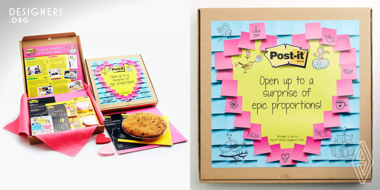 The idea had to be of epic proportions in order for the Post-it Big Pad to have an impact on it's audience. Everything in it had to be upsized to convey the message of think big, create big and love big! The idea of a customised 16" x 16" pizza box, together with a huge chocolate chip cookie was conceptualised. The pack contains two pads of Post-it Big Pads, sampling packs, Post-it Super Sticky Die-cut Notes, tabs, giant chocolate/strawberry sticks, heart shaped jellies. To package everything nicely, a pink felt cloth was used to wrap the items, giving it a more premium feel.