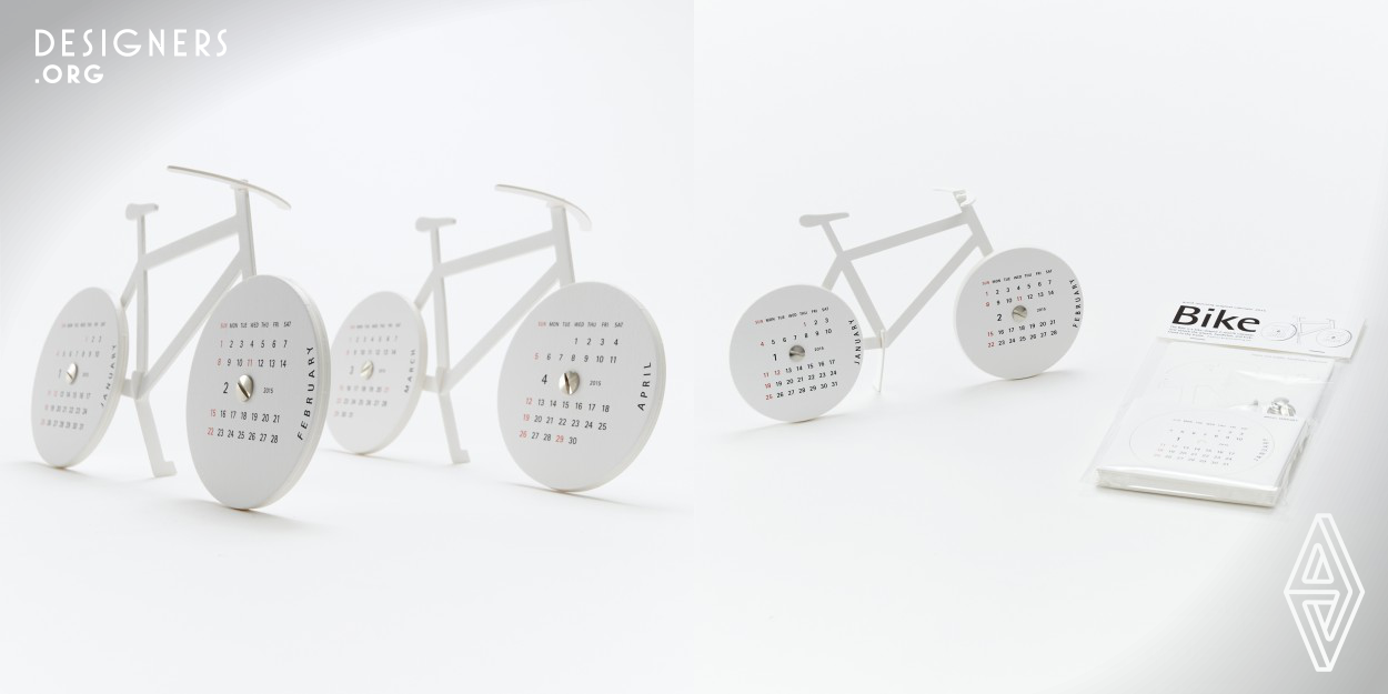 The Bike is a bicycle-shaped paper craft calendar. The set includes paper parts that forms bike and brass screws. Two months are shown at once, on the front and rear wheels. At the end of a month, that month is flipped over and placed behind the others on the wheel. The wheels are secured by screws and can turn. Quality designs have the power to modify space and transform the minds of its users. They offer comfort of seeing, holding and using. They are imbued with lightness and an element of surprise, enriching space. Our original products are designed using the concept of Life with Design.
