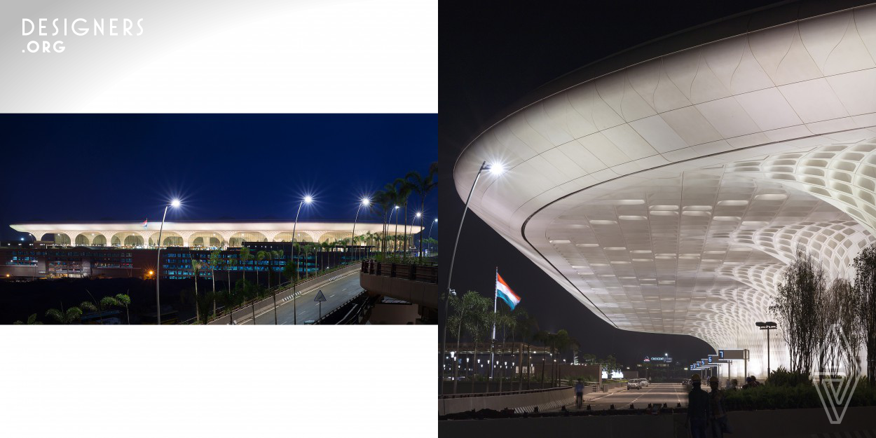 Located in the heart of Mumbai, the new hub adds 4.4 million square feet of space to accommodate 40 million passengers per year. By orchestrating the complex web of passengers and planes into a design that feels intuitive and responds to the region’s rocketing growth, the new Terminal 2 asserts the airport’s place as a preeminent gateway to India. The primary design feature of the building is a long-span roof covering a total of 70 000 m2, one of the largest roofs in the world without an expansion joint. The Terminal also includes the largest and longest cable wall system in the world.