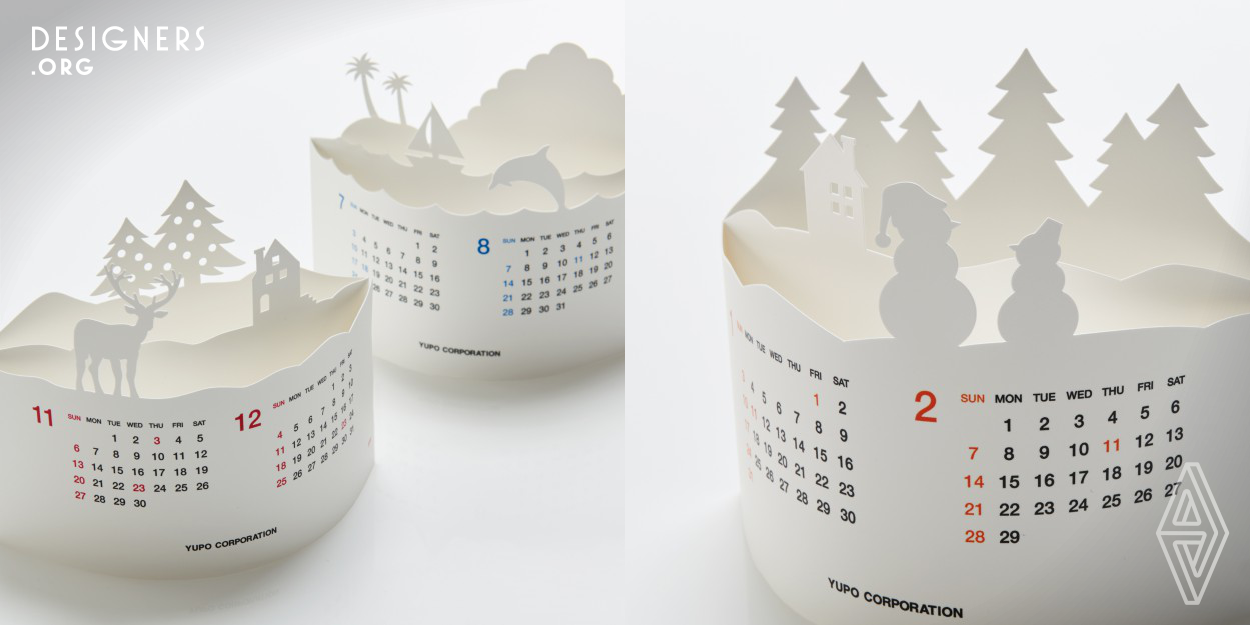 The Arc Calendar is a promotional item produced for the Yupo Corporation, the manufacturer of Yupo synthetic paper. YUPO® has water resistance and strength not found in paper but can be printed and processed like paper. This calendar expresses both the potential and the attraction of YUPO®. Made from a single sheet, it is folded and assembled into a three-dimensional visual object with foreground, middle distance, and background in arc form. This item originated out of the client’s desire to create a promotional item that is at the same time a heartfelt gift that brings the recipient joy.