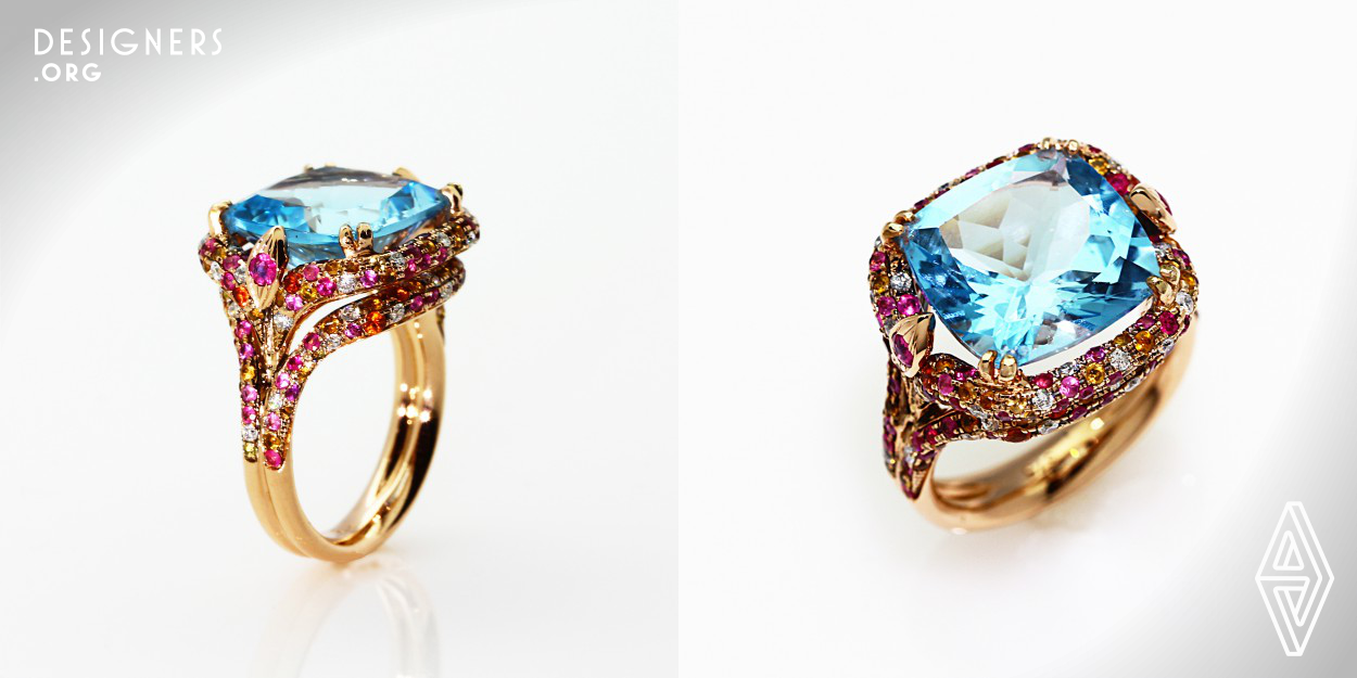 Inspired by the Garden of Eden, Sofia Lee seeks to capture the beauty of Mother Nature in the “Eden ring”. The designer’s bold use of colors and design are expressed through the cushion-cut blue topaz, soft combination of diamonds and vibrant sapphires of pink, orange and yellow on the double layer curvy silhouette. The Eden ring showcases a dramatic play of light from all angles, making the Eden ring a unique statement on its own.  