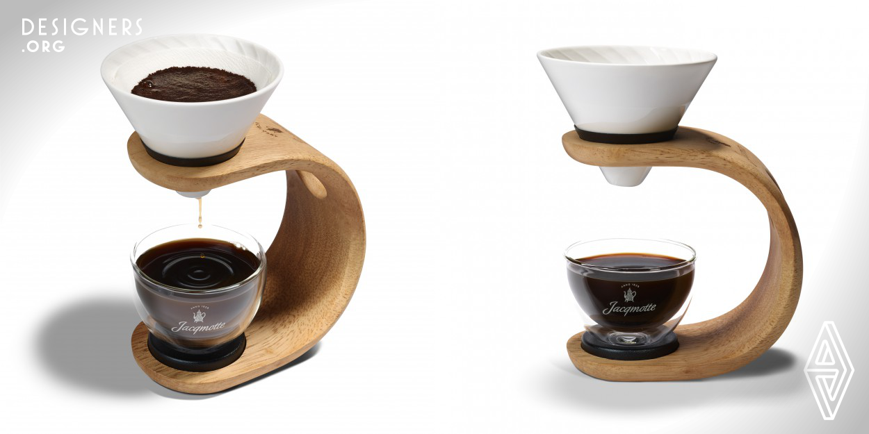 The "Slow Drip Coffee Maker" is unique in its kind and has been designed with respect for noble materials. Each part plays its role in creating a perfect slow coffee making experience. The filter cone is made out of bone china and its spiral shaped ridges give rise to a subtle extraction of aromas, that expose the strength and character of the coffee. The arc shaped wooden support is robust yet rich in its simplicity. The elegant roundness and transparency of the dubble sided glass let you discover and enjoy the subtle nuances of the coffee while it still has the right temperature.