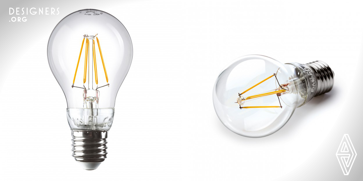 With the glass bulb, the LED-filament and the transparent ring between the glass bulb and the socket, the vosLED looks like Edison’s classic, does, however, only get hand-warm and weighs in with only 35 g. So it opens completely new opportunities to light designers and lighting manufacturers. The combination of different materials for leading and shielding of light for design and presentation reaches a completely new dimension. At the same time it uses all the potential of the LED-technology: a 90 percent lower energy consumption, ten times the lifetime and simple recycling.