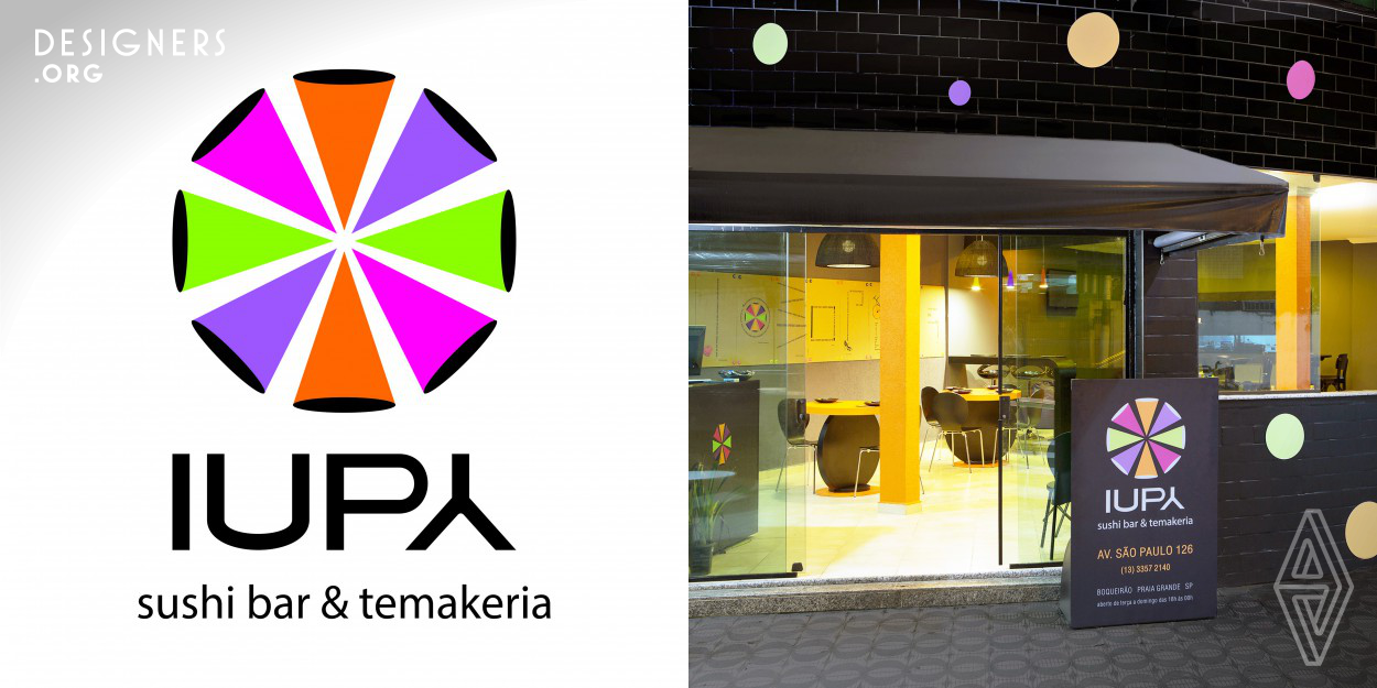 This branding project was created for a sushi and temaki bar at a beach city off the coast of the state of São Paulo, Brazil. The logo was inspired by the sun, by the shape of temaki rolls and by pop art, with intense and vibrant colors. Tables with holes to support the sousplats bring the innovative furniture design. Sustainability and interactivity are part of the project. Clients receive naturally dyed bamboo chopsticks, one hundred percent sustainable, in the brand colors. The walls are decorated with eighteen recycled cardboard panels with famous quotes.
