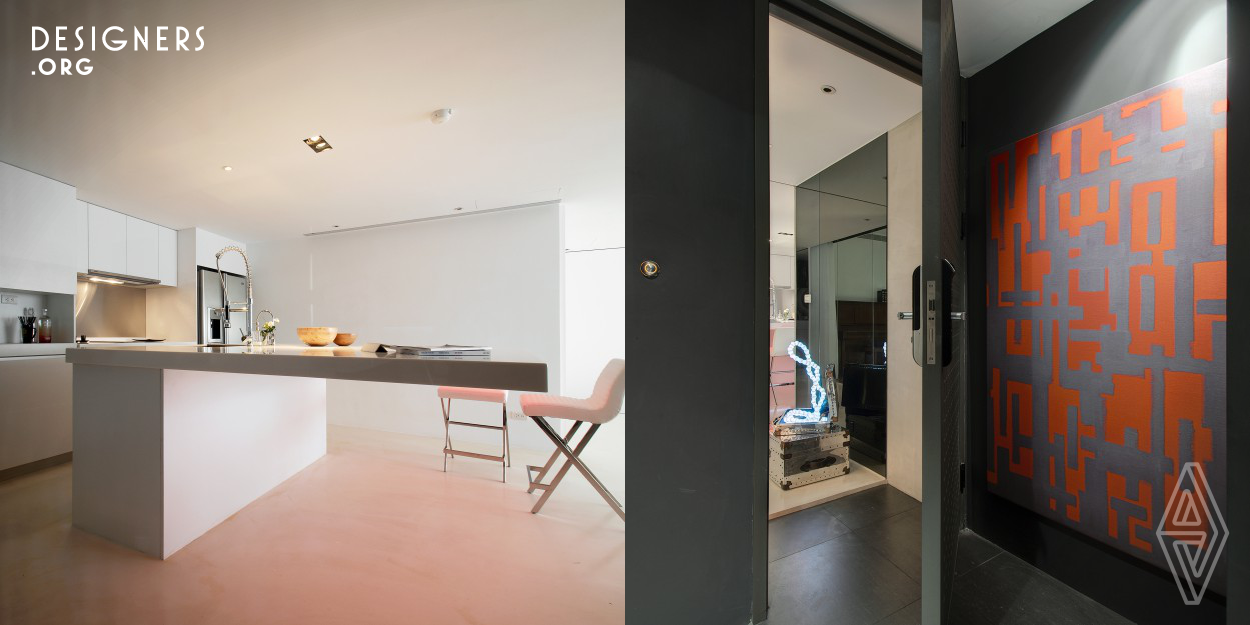 It is a 150 square meter apartment located in Taipei. The interior spaces are separated by color tones to form a route when coming home. Entering from a gallery-like foyer, a calm voice quiet the clamor down. A bright and clean space gives a big welcome when the front door is opened. Embraced by the pure atmosphere that takes away the vexation. And chestnut flooring delivered a fragrant of protected smell when walking into the bedrooms, which provides a good relaxing mode for bed.