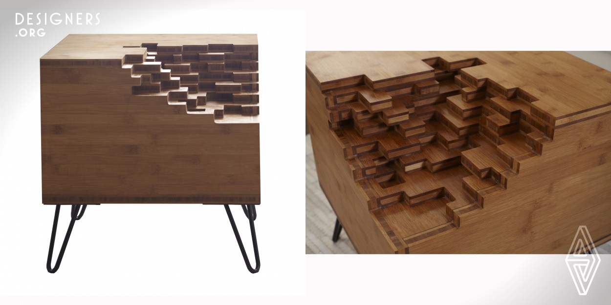 The Raster side table interacts with people by using the concept of building solids out of individual cubes of space. In this case 20mm blocks were the driving factor. Raster gives the illusion that this table is in the process of being made by assembling these blocks; conversely, it can be interpreted as a dissolving table. 
