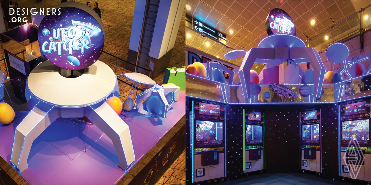Visual Studio came up with the concept of UFO catchers, where anybody with a valid boarding pass at Changi Airport Singapore, could enter this area at try their hand at the ‘claw’ machine and catch the ‘UFO’ capsules. Thereby, winning shopping vouchers and in turn increasing the airport’s sales. UFO catcher is a free to participate event at the transit area of airport, as long as passenger has a valid boarding pass. UFO catcher's name is inspired by the game mechanism of a doll catch machine. 