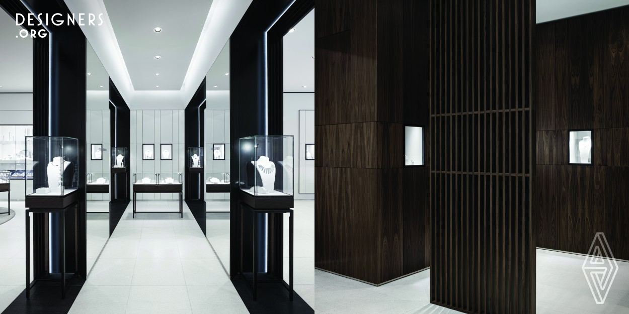 Georg Jensen's new flagship store in Munich is inspired by geometric, Scandinavian and Art Deco references, all stemming from the brand history. The gallery-like store showcases the Danish silversmith's most prominent pieces of hollowware, jewellery and watches. Each merchandise category has its own defined space and atmosphere, and the customer is led through the store, one space at a time. The natural materials of dark walnut timber and grey honed terrazzo stand in a warm contrast to the black steel and light grey walls and floors, creating a sophisticated yet clean interior space