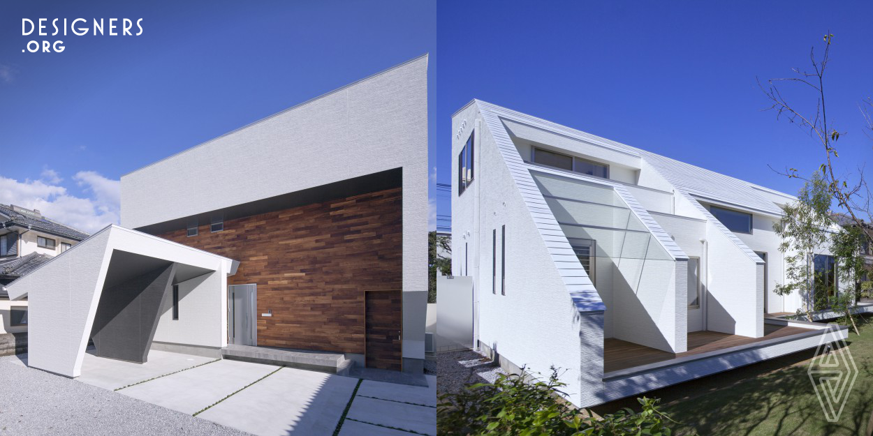 I3-House was planned in the residential area at the top of the hill of Miyazaki City, Japan.As we proceed with the design, it was necessary to consider legal restrictions and regulation regarding the cliff on southeast part, and also to take account for wind loads from sea direction. To obey these conditions, terrace balcony on the southeast side was designed to floated from the ground surface in a cantilever manner, this way one can enjoys spectacular views of the city and Hyuga sea. In addition, the roof shape was designed in order to minimize the wind pressure loads and in case of typhoon.