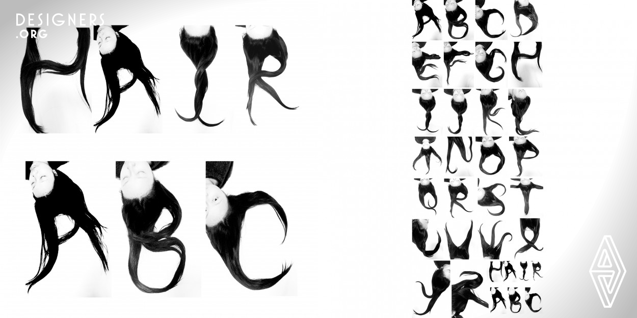 This font was made from the long hair of a girl. To combining the long hair with the Latin alphabet might born a different appearance from some common typography. The girl's long hair and stroke of the characters gave the designer the inspiration. And the long hair is soft and convenient to make back and forth to make some patterns. This patterns could be looked like the Latin alphabet.  Using a camera to take photos and designing the patterns by photoshop were the production technology of the work. The project started in October 2015 in Xian and finished in January 2016 in Yangzhou. 