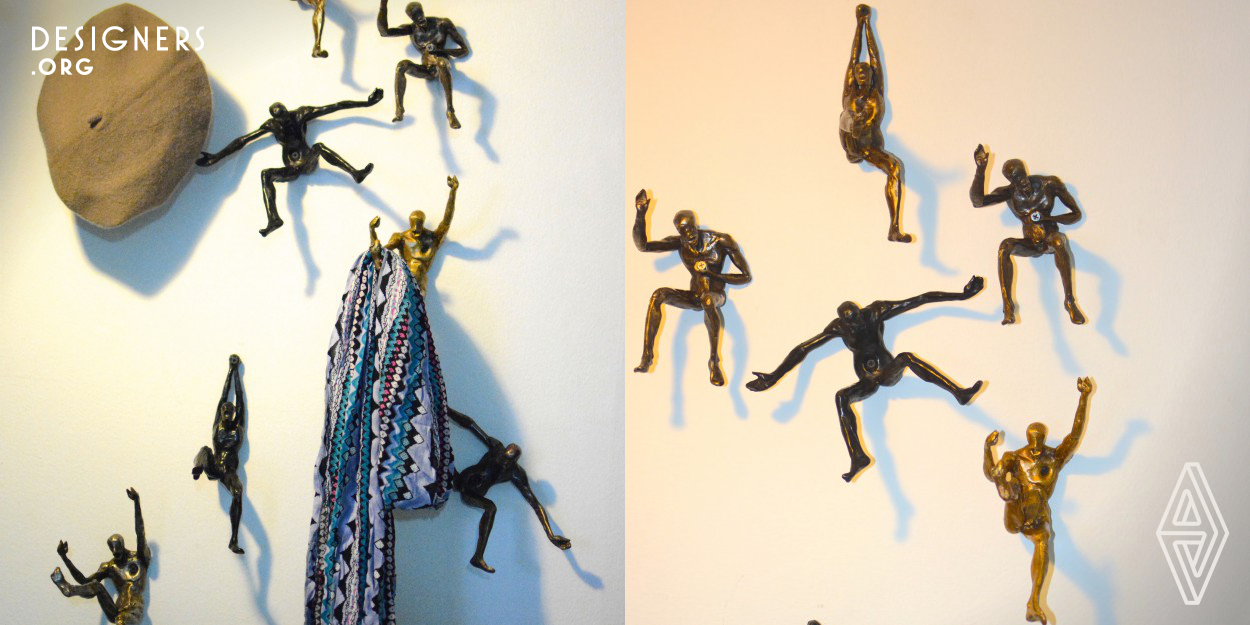 This sculpture serves two main functions which are aesthetic appeal and useful functionality as a fashionable hanger. The objective of "Man on the Wall" is to exhibit aesthetic form and usefulness for hanging items like belts, hats or clothes. The sculpture is designed for wall installation to make it well defined as one object. The configuration represents the effects of reflex to the momentum; unified direction and intensity of the design. This conveys force of masculinity projected to the artwork with simplistic detail that reflects response from the audience.