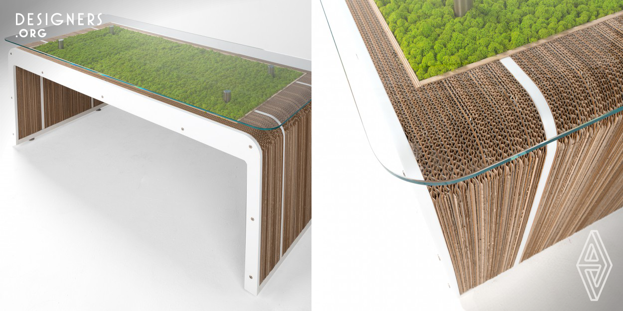 MorePlus Desk with natural moss is an eco-design table with a cardboard body and wood finishes. Under a tempered glass top a moss rug lives with the only humidity of the air. A table that strikes for its visual and tactile properties but most of all for the open-air sensation that brings to our interior spaces. Every part of MorePlus Desk with natural moss can be separated to go to recycling and different disposal, it is repairable and customizable. Pure lines and the association of different materials are striking features of this stylish table. 