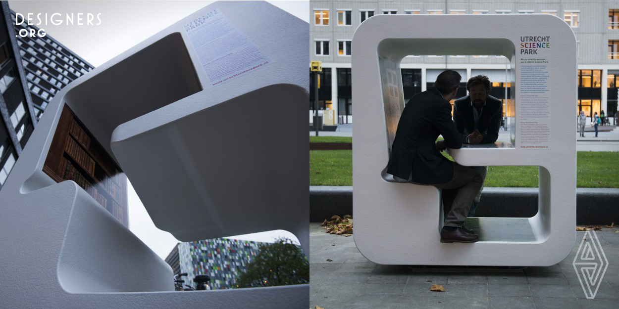 WorkAway is a comfortable workplace for the public space. As an ergonomic desk for one or two people it supplies shade and some weather protection. The lightweight cube can be rotated to avoid direct sunlight or wind. Made of an insulating material, the seat and desk feel warm to the user. The inner space has an acoustic quality that keeps the conversation inside of the cube. Large areas on the outside can be used for advertising or promotion. WorkAway is suitable for various locations, including business parks, campuses and public transport nodes for working or for holding a meeting.
