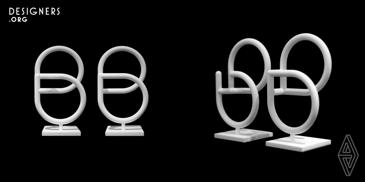 Daeki Shim and HyoJun Shim produced the alphabet B by getting a motive from Venn diagram of a plane shape, which expresses the meaning of the word Between. They also produced B 3-dimensionally through the 3D printer. These two 3D printed symbols are seen as the alphabet B of the same plane when they are seen at the front. However, its form changes according to the switch of an angle, and viewers can see the two 3D printed symbols were designed in an individually different structure.