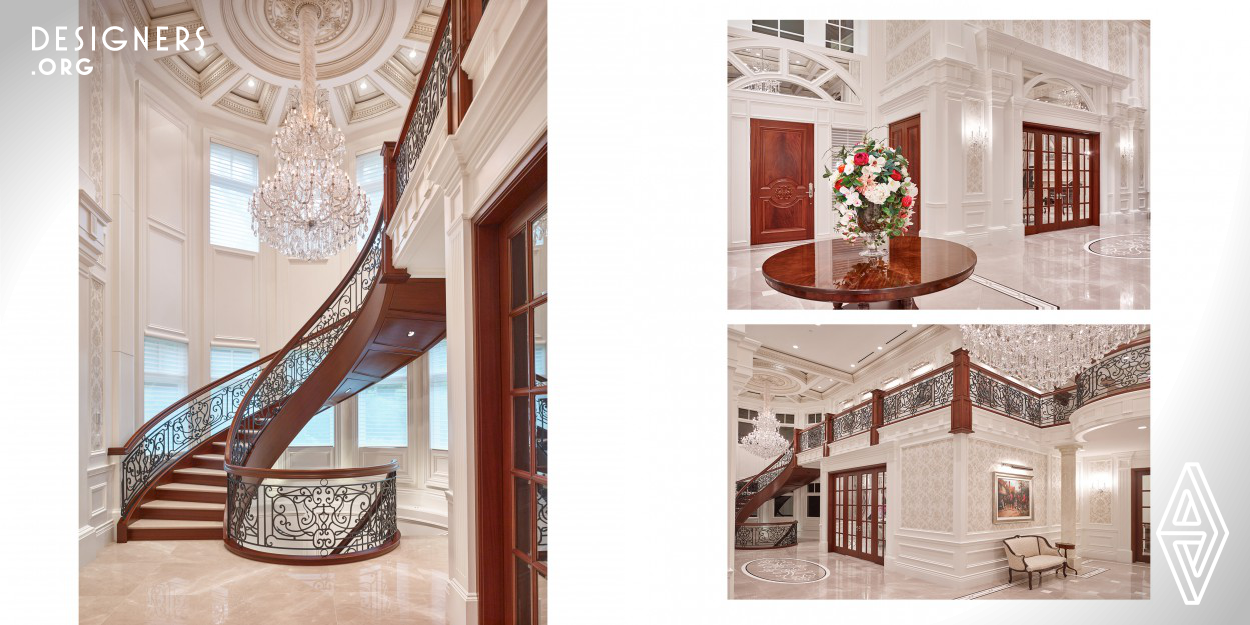A two-storey foyer introduces this residence’s unifying theme of opulence: inlaid marble flooring, domed ceilings with silver-leaf inlay and hand-painted motifs, exotic-wood millwork, and custom-designed metal filigree accents. Floor-to-ceiling columns plus archways and curved transom windows add architectural weight and visual grounding. Lower-level pool features hand painted mural where forced-perspective creates illusion that a pathway behind the fully-functional fountain is always moving away from the observer.