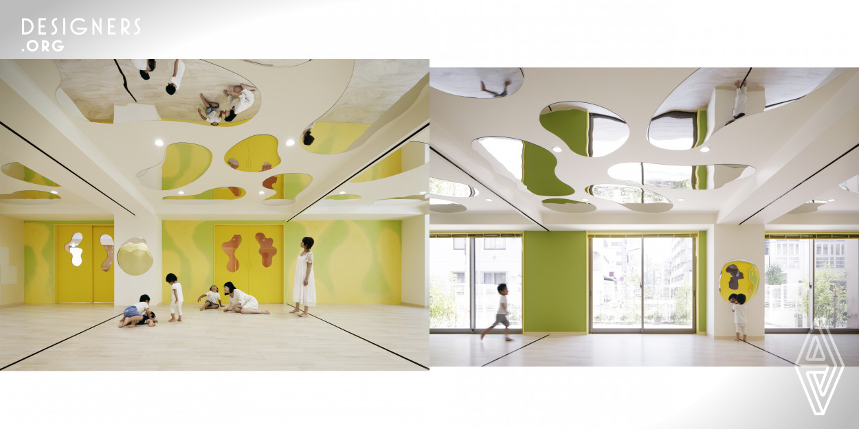 We designed a playful and exciting interior of kindergarten. We experimented with a landscape design populated with lakes, hills and mountains that would inspire children a variety of uses and fun ways to play by stimulating their imagination. Here, the scenery and relief associated with nature is echoed throughout the space by a cleverly designed stage resembling a hill, furniture representing small mountains, caves or cabins and mirrors reminiscent of the surface of a body of water, while the color gradations of the walls feature a palette evoking the beauty of nature.