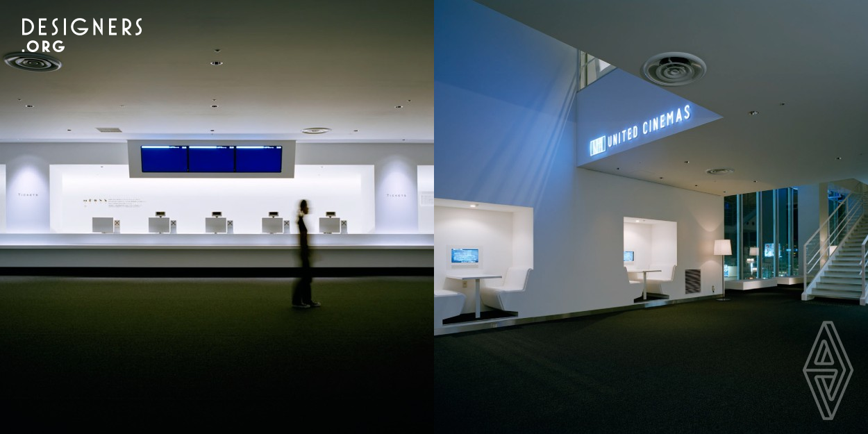 The cinema lobby, corridor walls and ceiling painted in white and the carpet is black. A projection room is glazed so customers can see projectors and engineers which actually works there. There is a Projection Museum. The Museum has the 35mm Film Projector, a Xenon Lamp, 35mm films and 70mm films, a Open Reel and Tools. A Cinema Library Cafe is available which has 500 books about movies. These elements stimulate customers' intellectual curiosity and the sophisticated interior space takes on a role of harmonizing them.