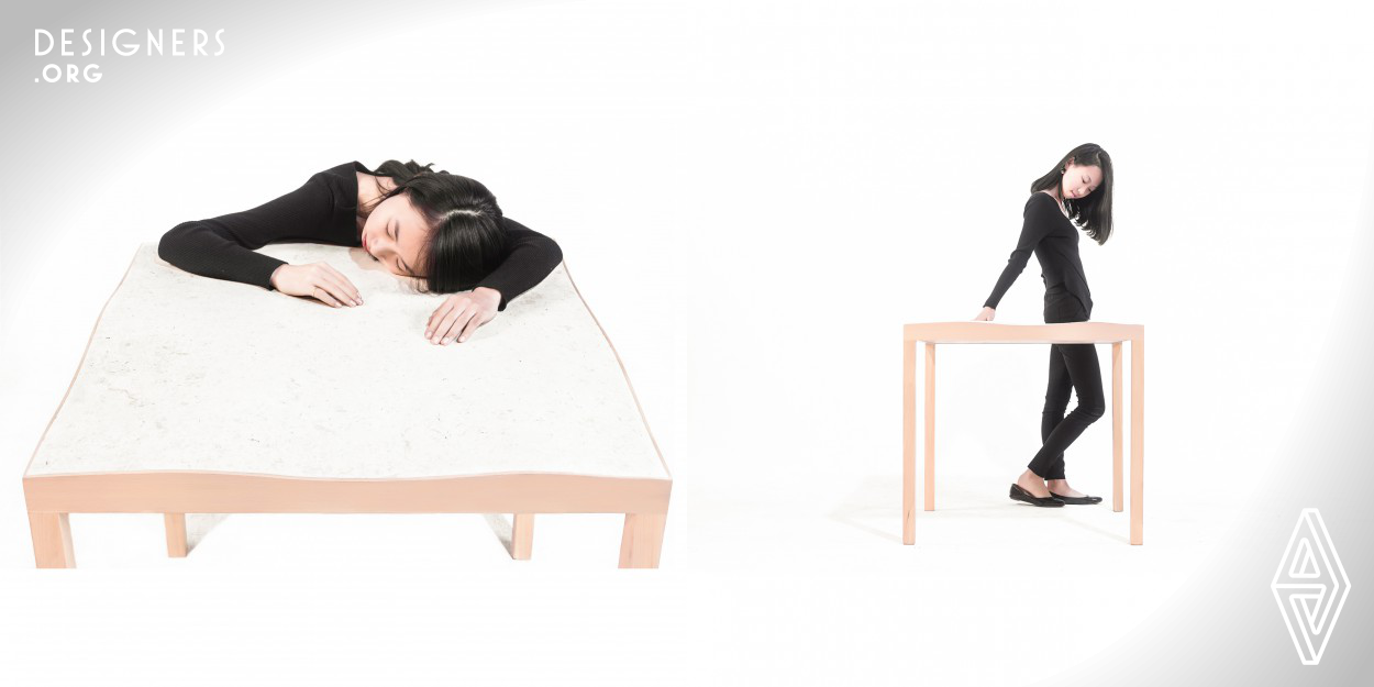 The unique feature of soft table lies in excavating the special nature of paper in order to design it for the undulating shape. Its function is defined for taking a sleep or a snooze. The curves on the table top are in accord with the curvature changes of human body engineering. It is fit for the posture when people bend over the table and it is also for normal use. 